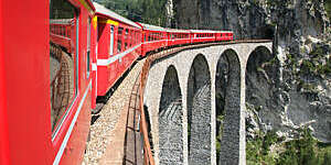 Bernina Express train on the Swiss alps.